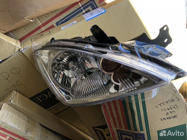 Фара Mitsubishi Lancer 9