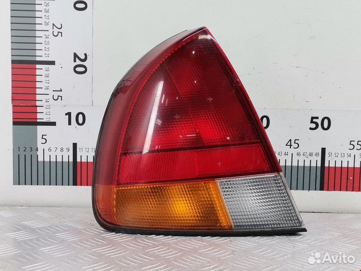 Фонарь для Mitsubishi Carisma