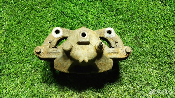 Суппорт тормозной передний левый Chevrolet Cruze