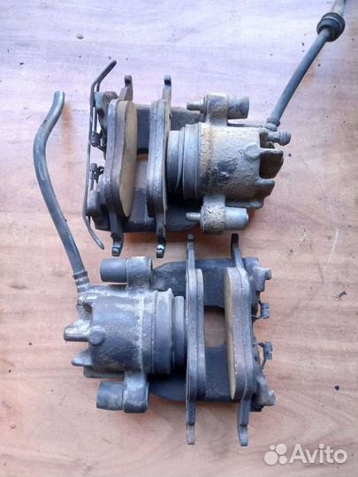 Суппорт тормозной передний Ford Focus 1