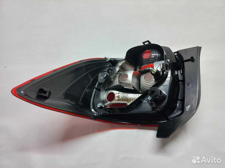 Фонарь левый Renault Logan 2