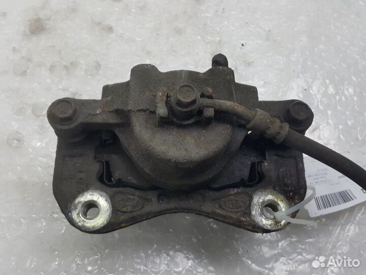 Суппорт тормозной передний правый Kia Rio