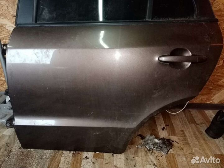 Дверь задняя левая Hyundai Santa Fe 2011г CM