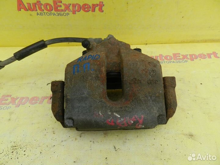 Суппорт передний правый Skoda Rapid