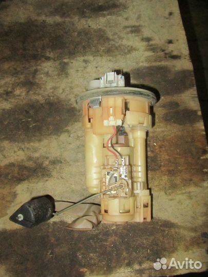 Насос топливный электрический Toyota Corolla E150