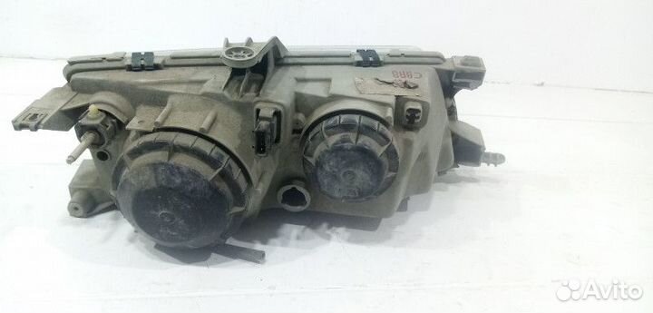 Фара левая Saab 9-5 1