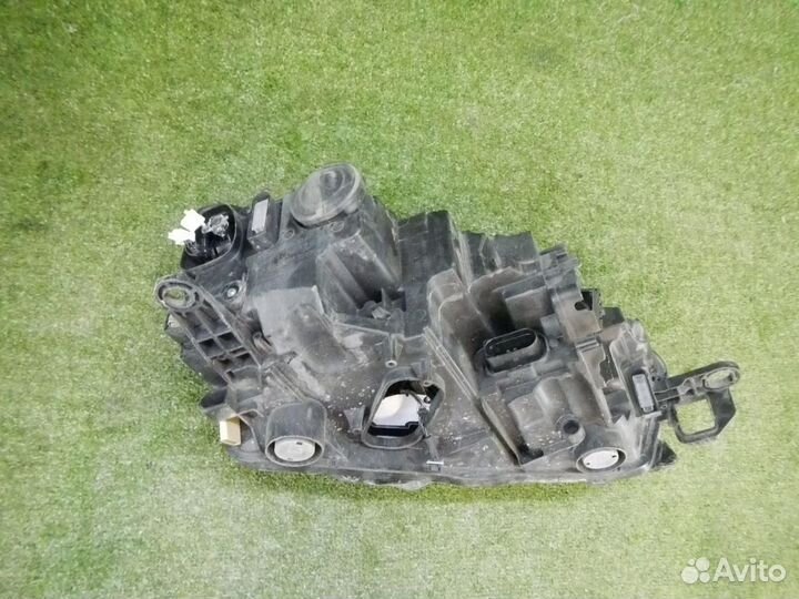 Фара левая Skoda Rapid