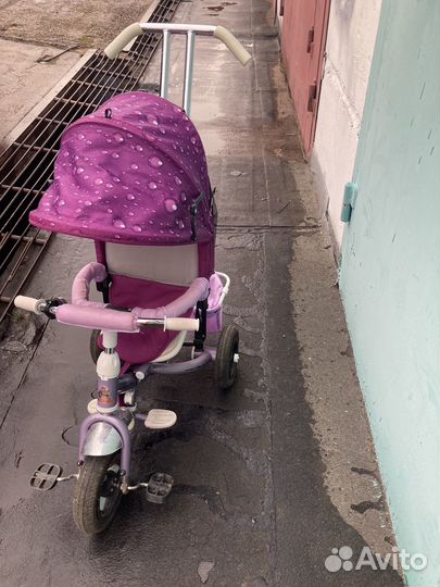 Трехколесный велосипед с ручкой