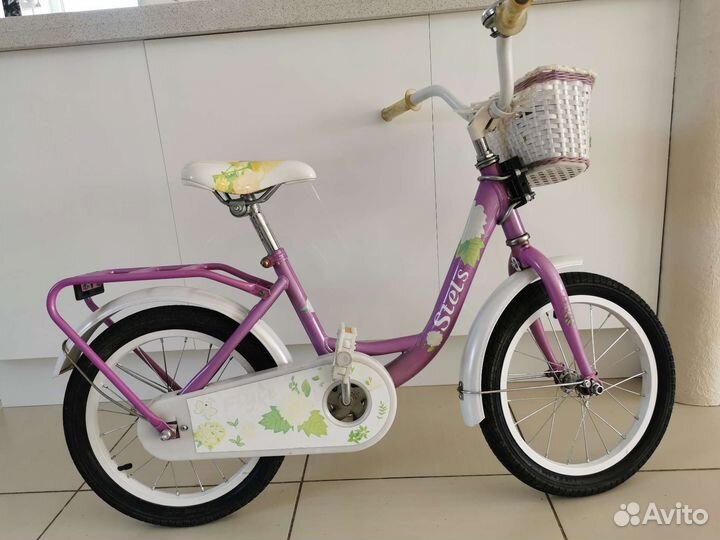 Детский велосипед с боковыми колесами