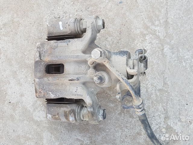 Суппорт задний правый 583601Y300 KIA picanto 2008