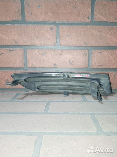 Заглушка бампера toyota corolla fielder NZE124G 1NZ-FE FR/LH