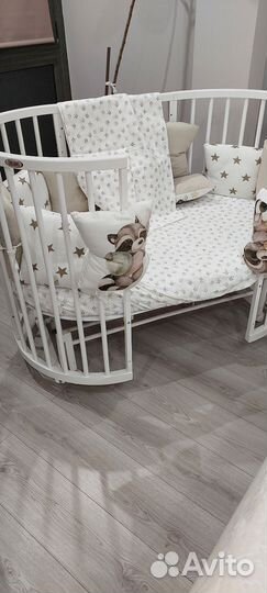 Детская круглая кроватка с маятником