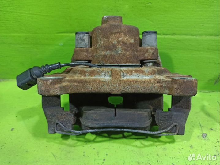 Суппорт тормозной передний Volkswagen Tiguan NF