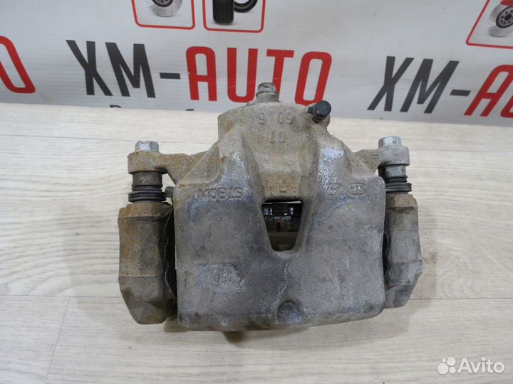 Суппорт тормозной передний правый Kia Sportage 4