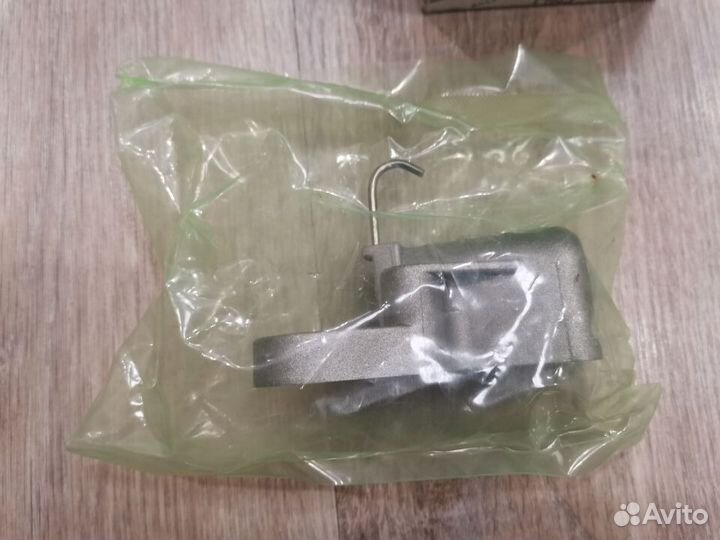 Натяжитель цепи грм 6710500211 ssang yong