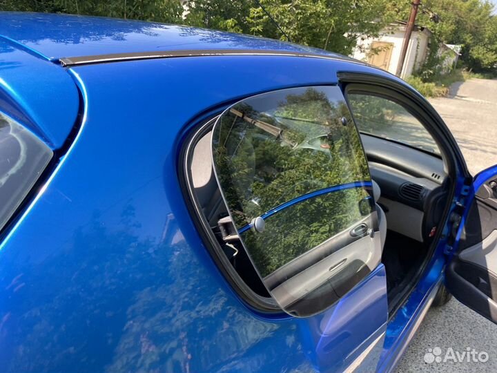 Задние распошные форточки Peugeot 206