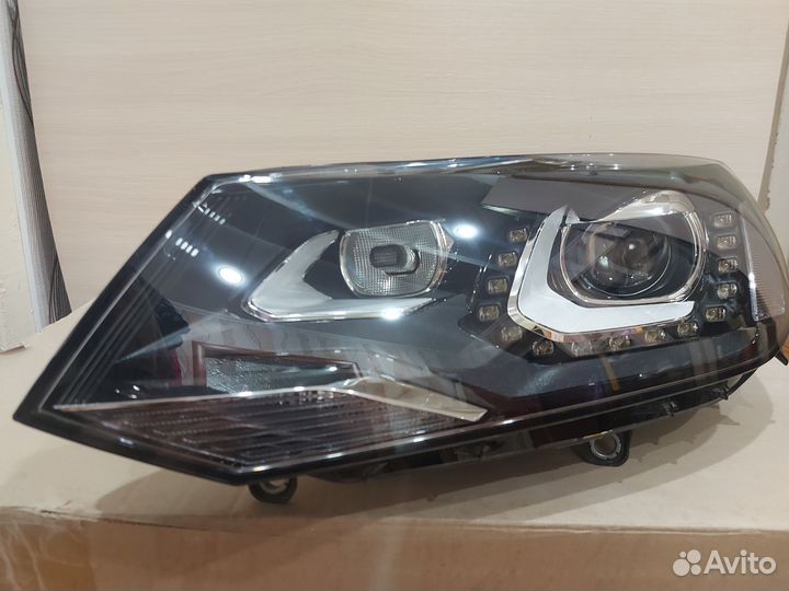 Фара левая Volkswagen Touareg nf (2010-2014)