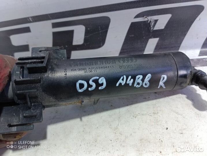 Форсунка омывателя фар передняя правая Audi A4