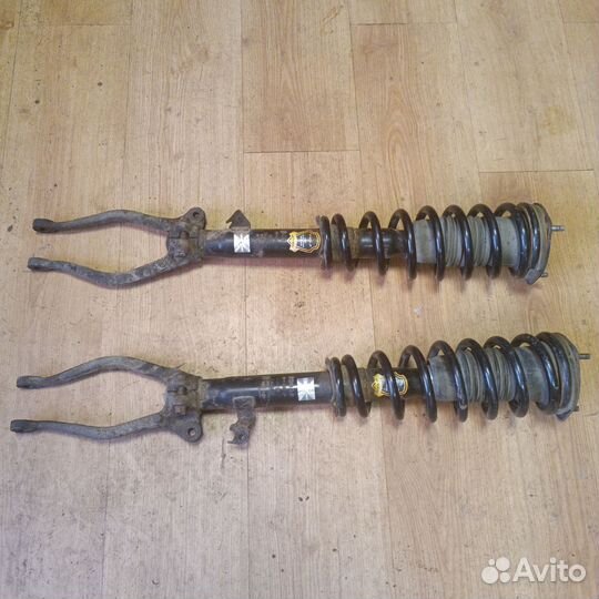 Передние стойки mazda 6 gg
