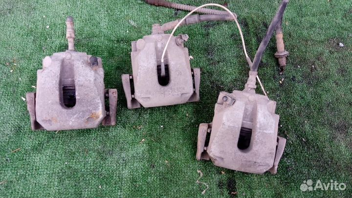 Суппорт тормозной задний BMW 5 серия