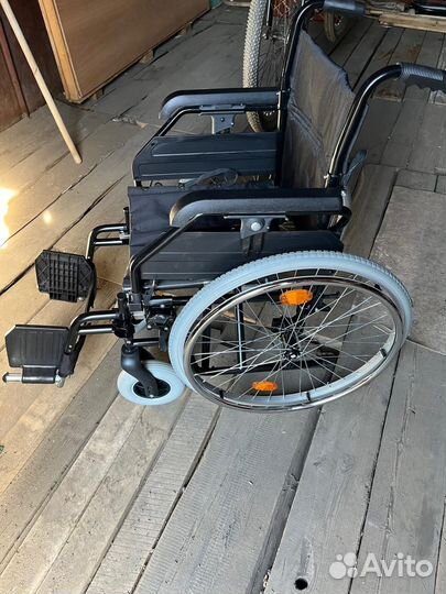 Инвалидная коляска