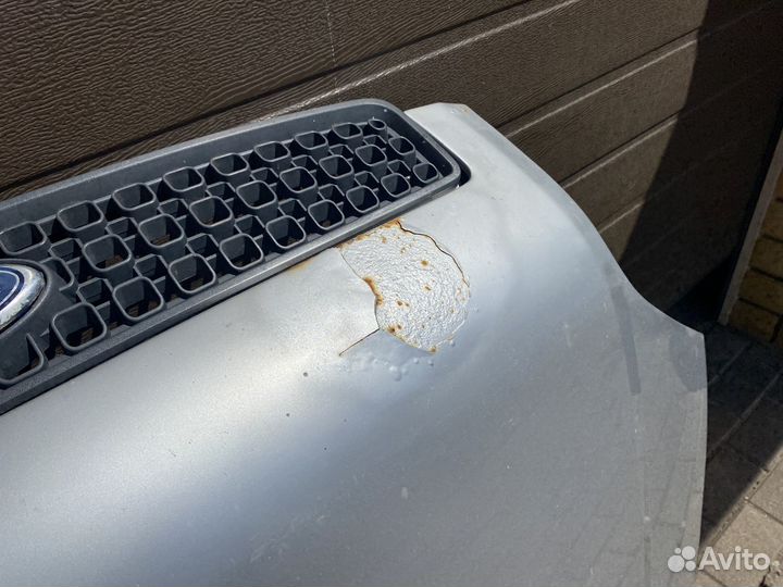 Капот с дефектом Ford Fusion