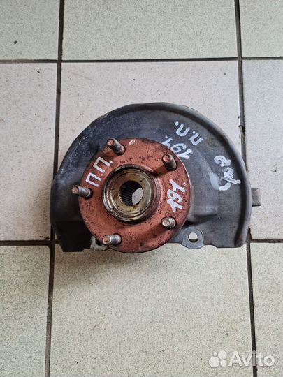 Поворотный кулак передний Mitsubishi Lancer X