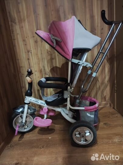 Трехколесный велосипед с ручкой