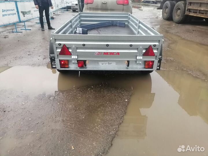 Двухосный прицеп 817730.022 с тентом 50 см