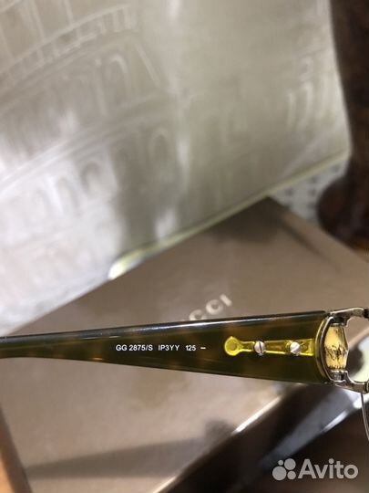 Солнцезащитные очки Gucci