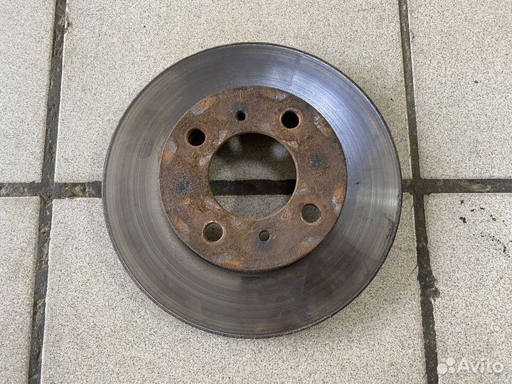 Тормозной диск передний Mitsubishi Lancer VII