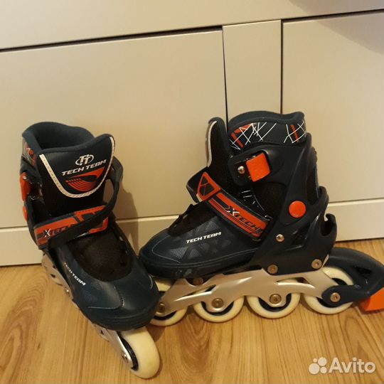 Роликовые коньки