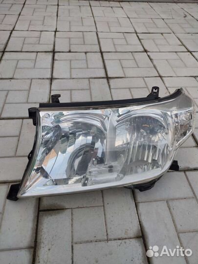 Фара левая Тойота Ленд круизер 200