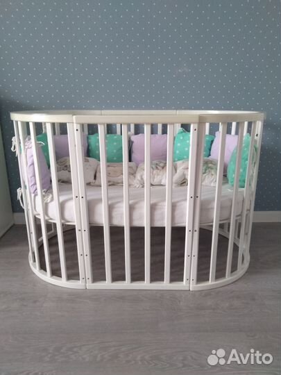 Детская кроватка с маятником круглая