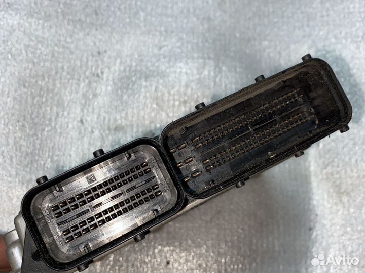 Эбу 06F906056DK Passat B6 2.0fsi BLX