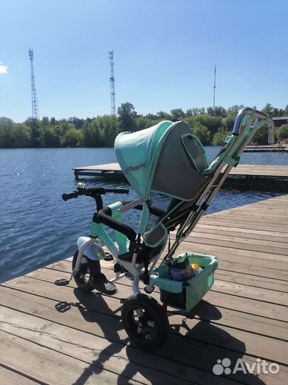 Коляска трёх колёсная