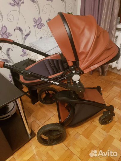 Коляска кожанная