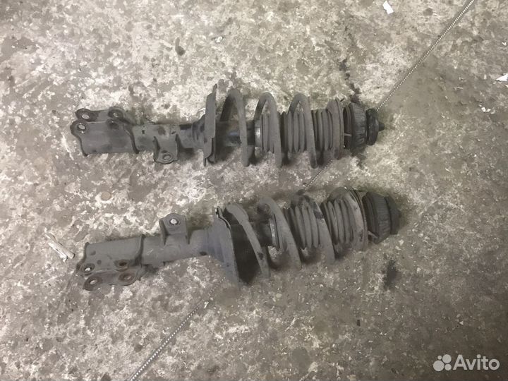 Стойки передние хендай солярис