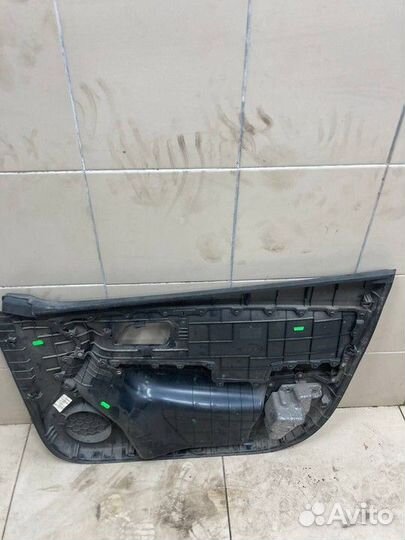 Обшивка двери передняя левая Kia Rio