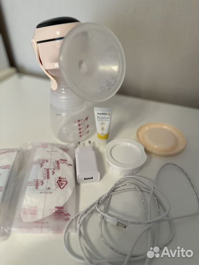 Молокоотсос электрический
