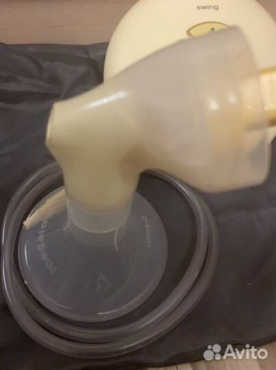 Молокоотсос medela электрический