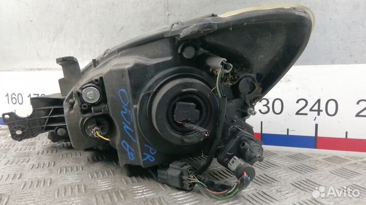 Фара Mitsubishi Lancer 9 (2003-2009)