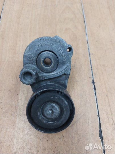 Натяжной ролик приводного ремня Opel Astra H