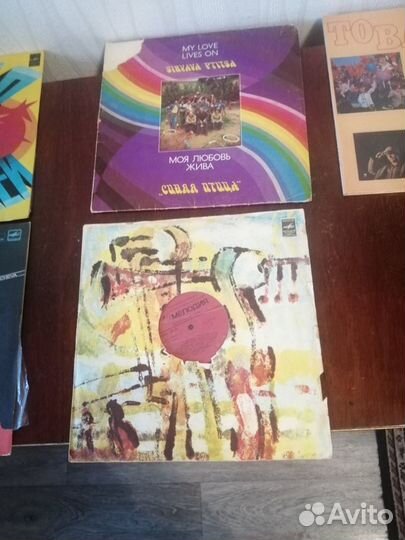 Виниловые пластинки и проигрыватель