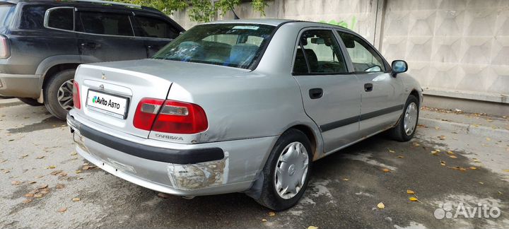 Mitsubishi Carisma 1.3 МТ, 2003, 300 000 км