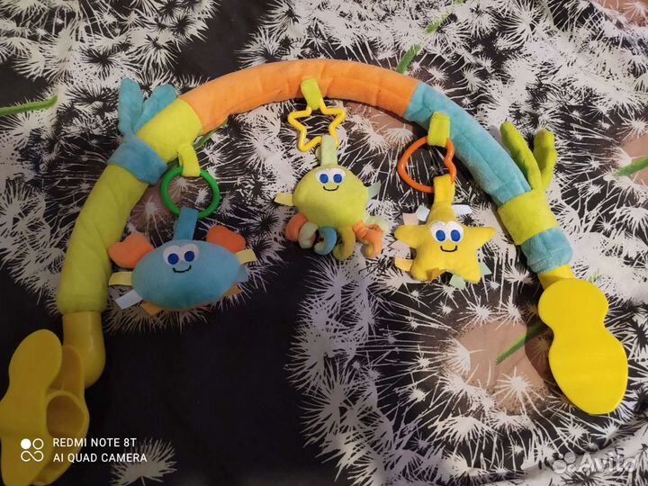 Дуга с игрушками