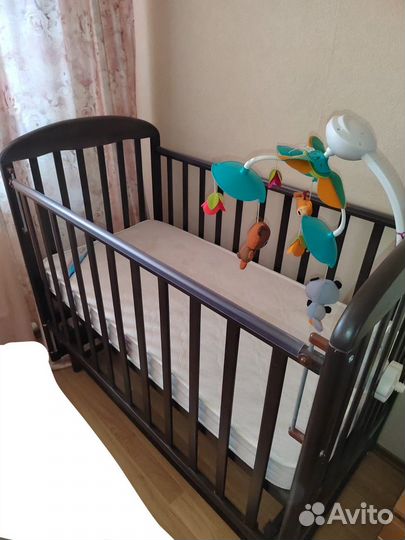 Детская кроватка с поперечным маятником