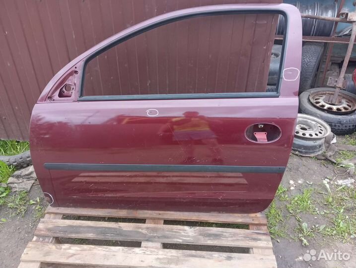 Дверь левая Opel Corsa C