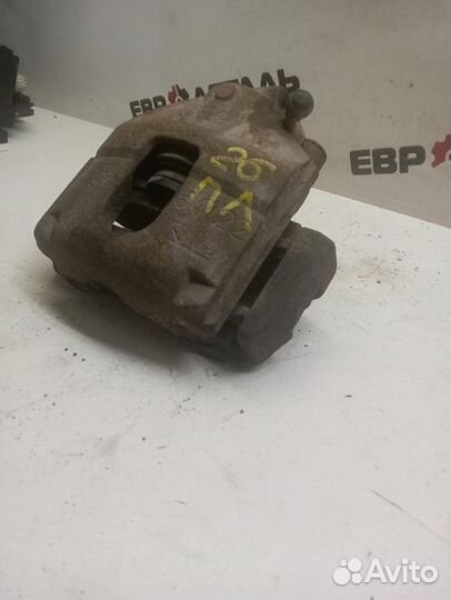 Суппорт тормозной передний левый Ford Fusion