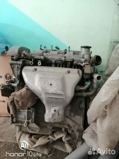 Двигатель на мазда премаси 2002г